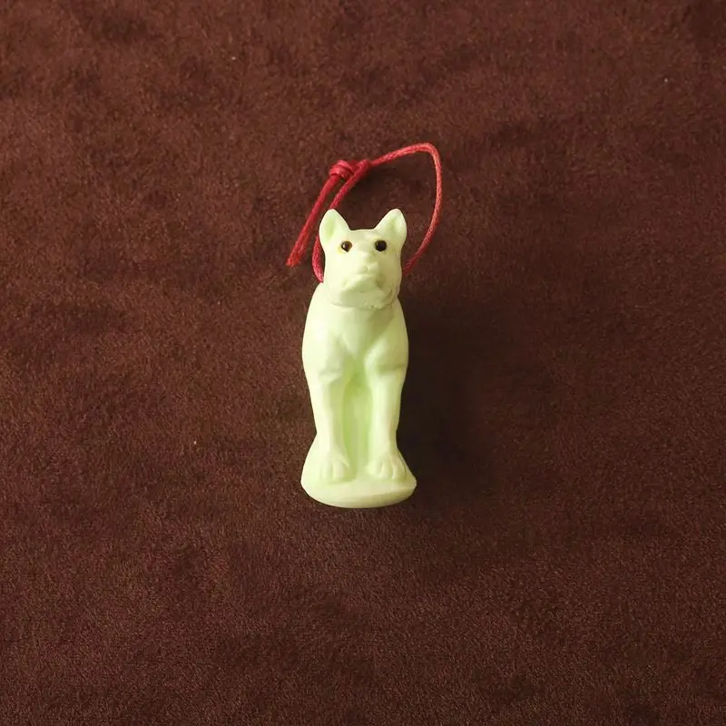 

Hand-Carved Lemon Jade Dog Pendant – Natural Pale Green Gemstone Sculpture with Red Cord for Artisanal Jewelry & Collectibles