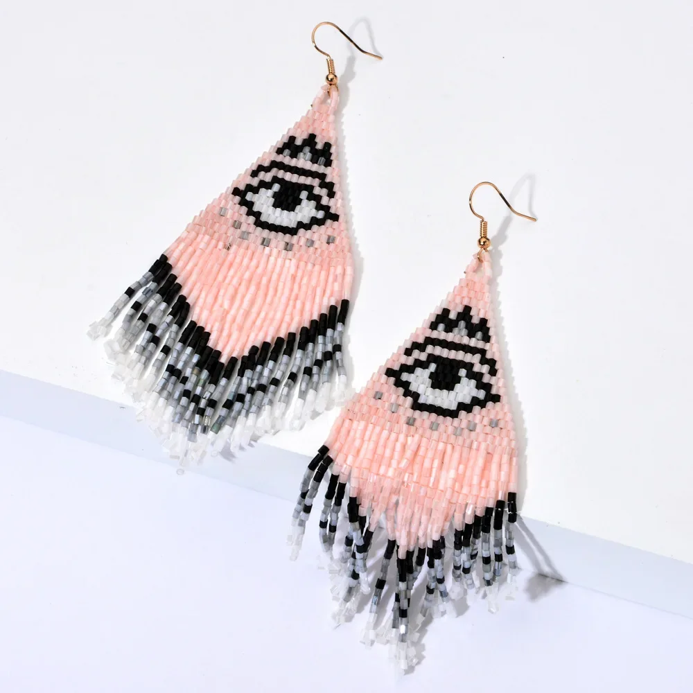 Rice bead earrings Tassel Devil's eye Originality Hand knitting Bohemia Alloy Fashion Simple Design Beaded earrings