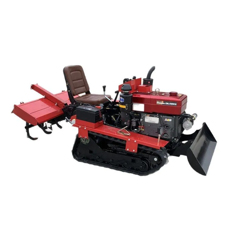 Household small agricultural rotary tiller rides on tracks with engine core for hard and clay trenching