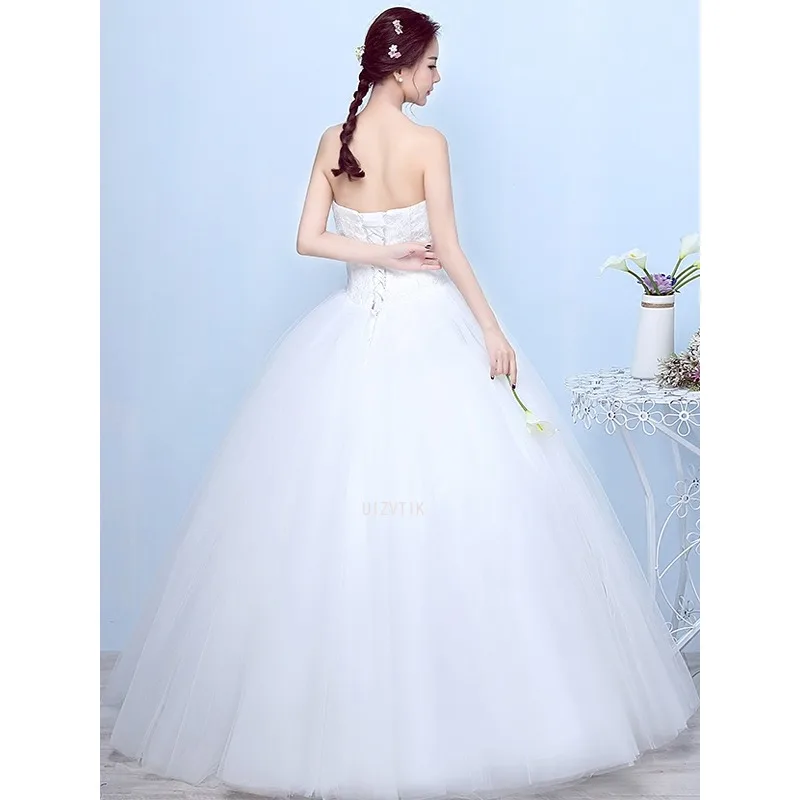 فستان زفاف أبيض بسيط بدون حمالات من الدانتيل بأربطة بطول الأرض فستان حفلة العروس الخفيف الفاخر خارج الكتف فستان حفلة الأميرة