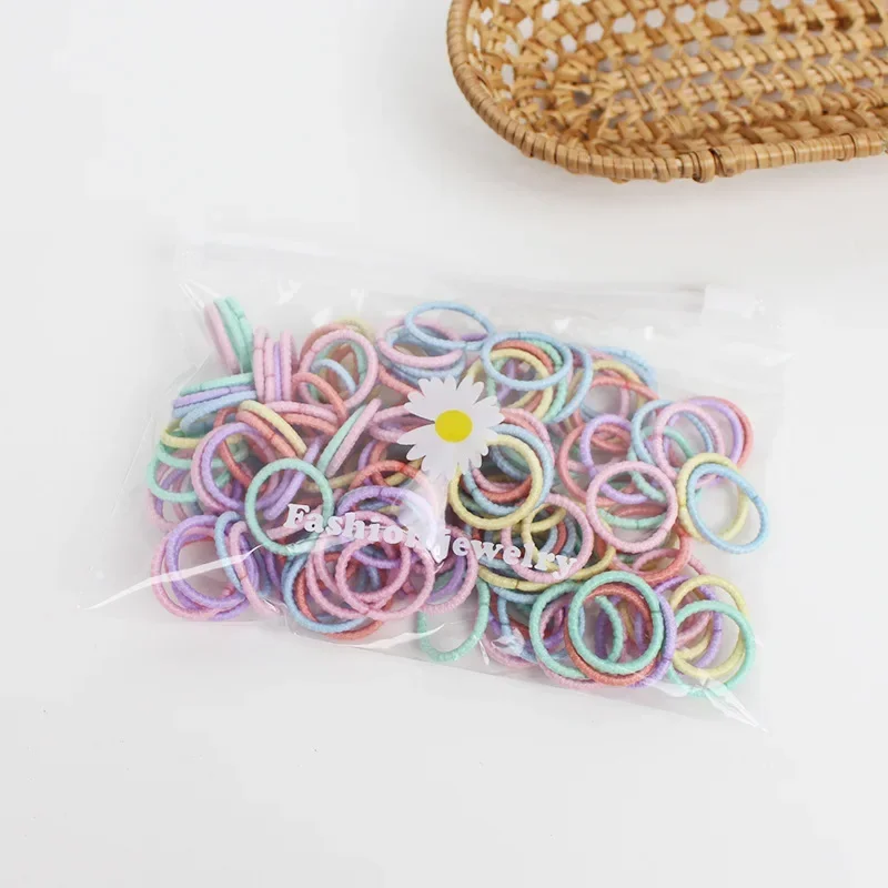 100pcs Chrysanthemum Pocket Small Rings Mini Thumb Hair Rings Baby Small Elastic Cords Not Damaging Head Rope 2cm Elasticity