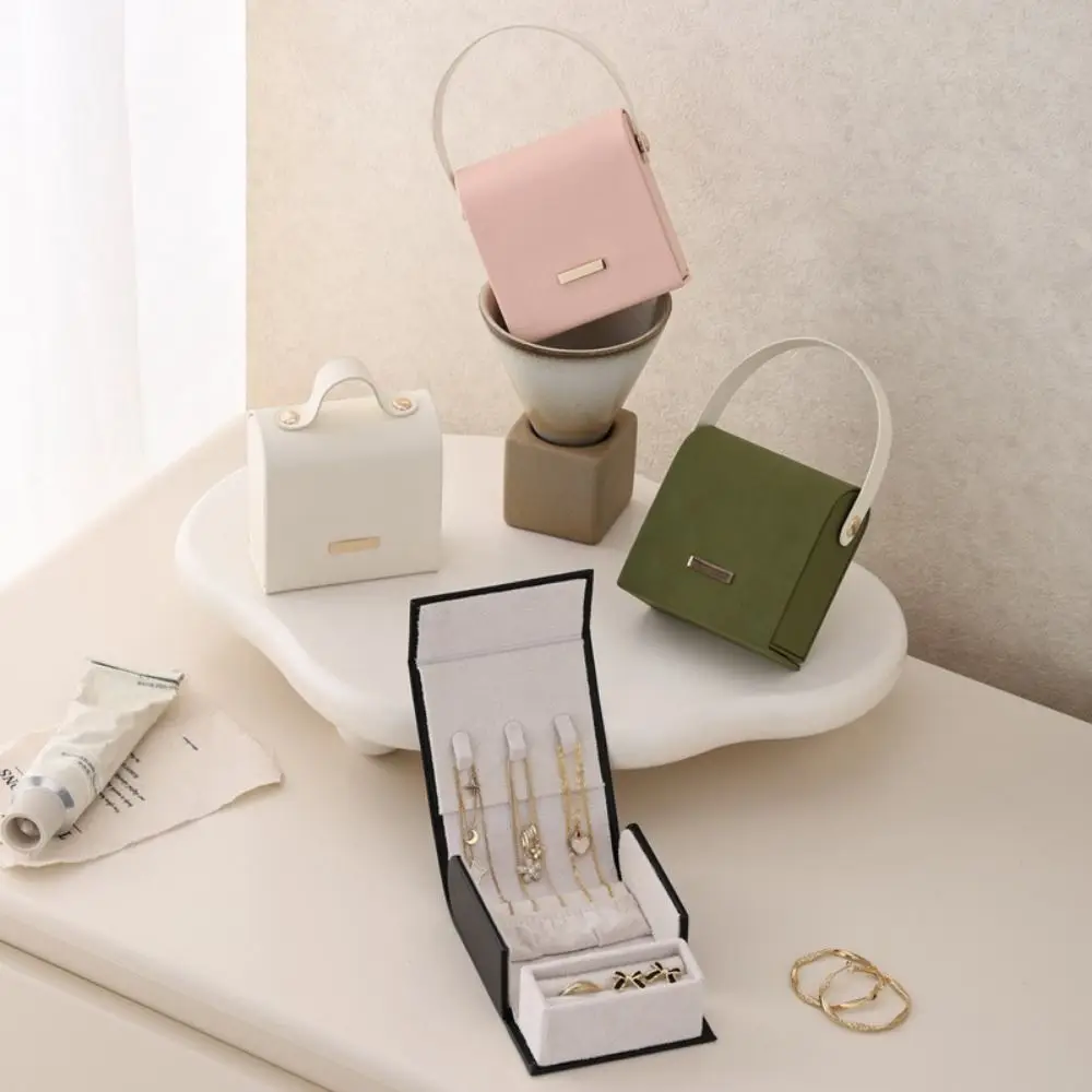 

Hand-Held Jewelry Packing Bag PU Leather Rings Necklace Earrings Storage Case Organizer Handbag Appearance Jewelry Display Box