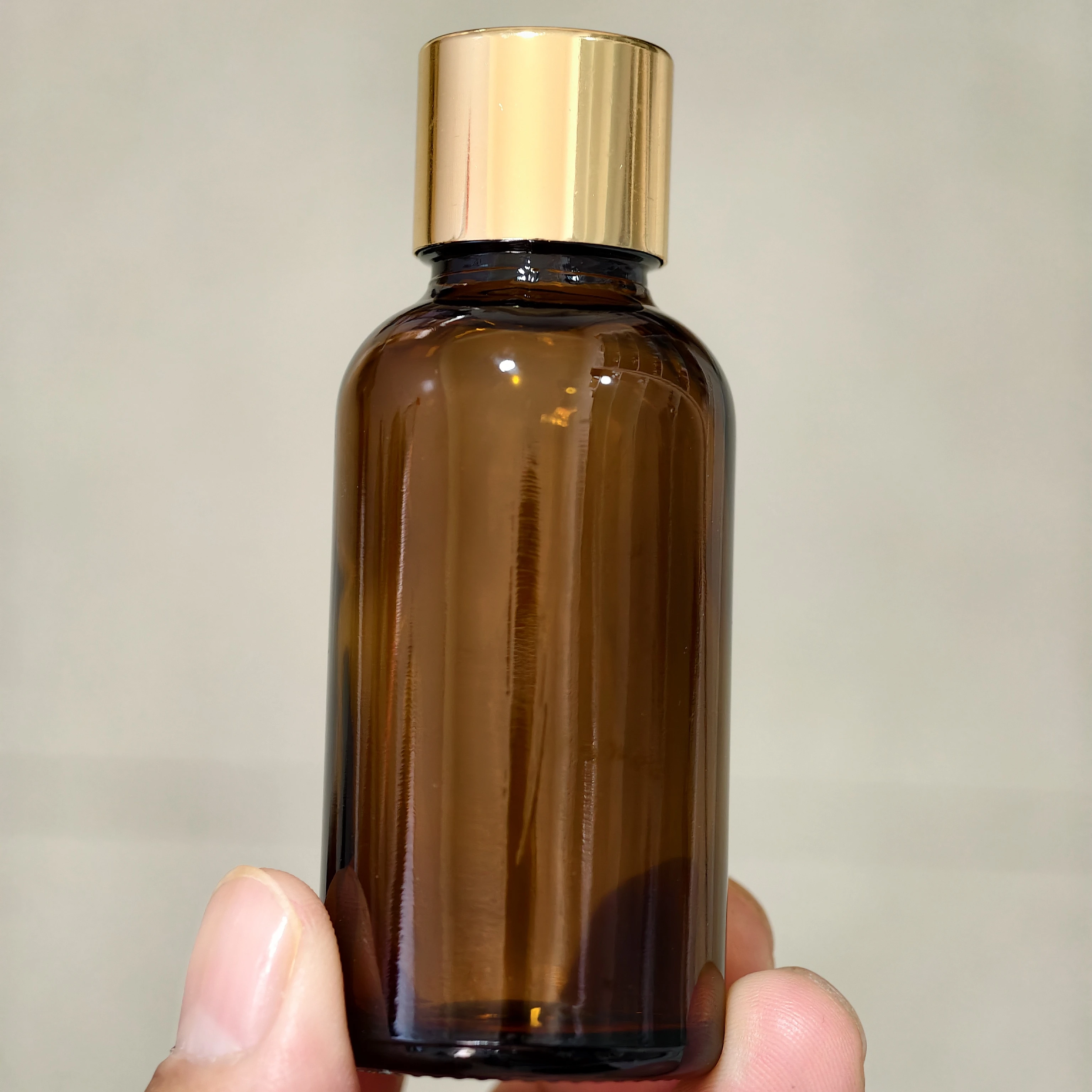 

500pcs 5ml 10ml 15ml 20ml 30ML 50ml 100ml Amber Glass Bottle Vials Essential Oil Bottle With Gold Screw Cap Perfume Bottles