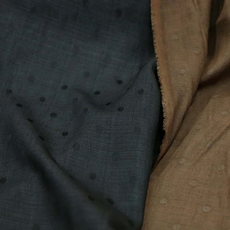 

The vintage polka dot jacquard traditional Xiangyunsha silk fabric is elegant and simple a new Chinese-style designer's