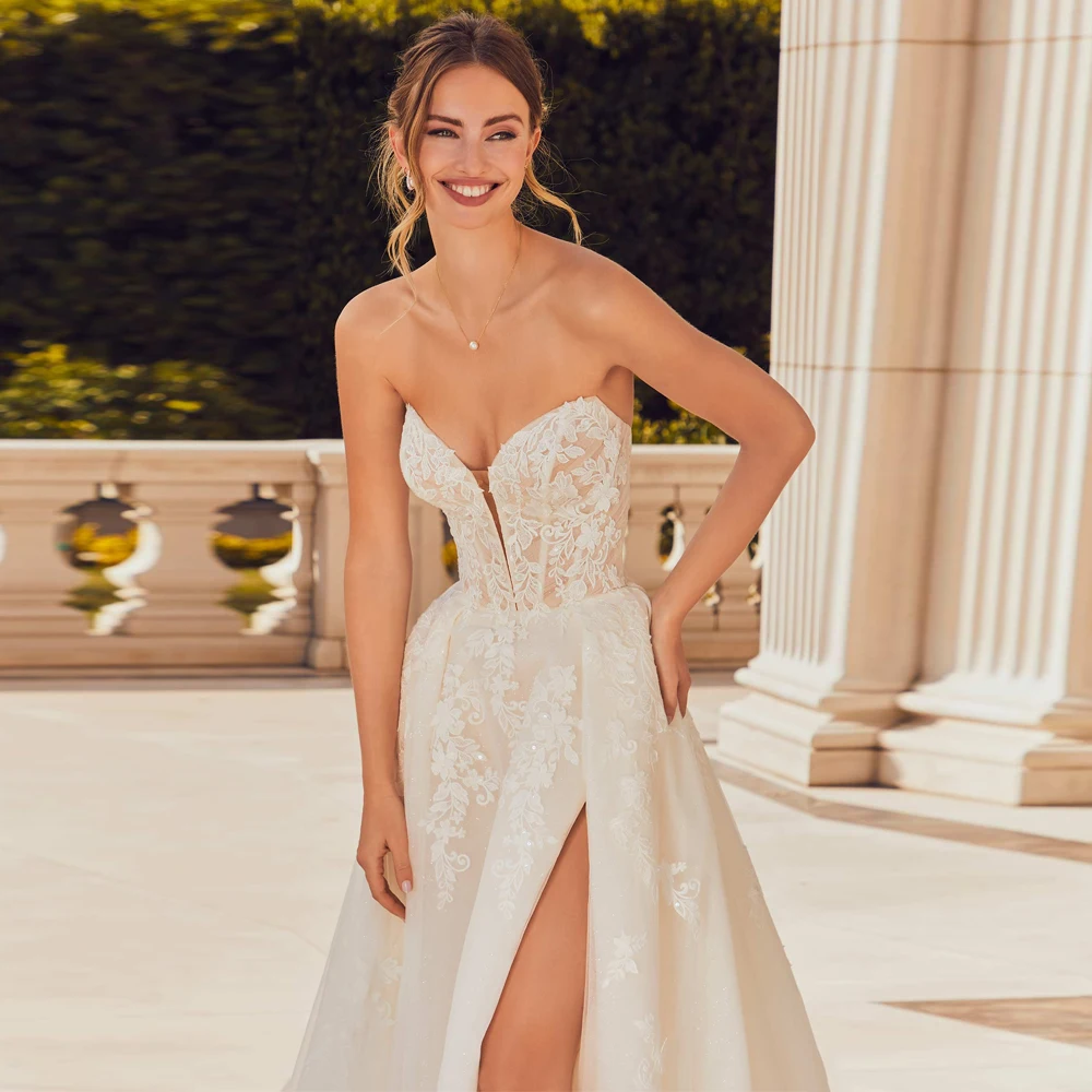 Personalizado elegante sem alças vestidos de casamento sem mangas frente fenda nupcial crescido apliques tule a linha vestido de novia 2025