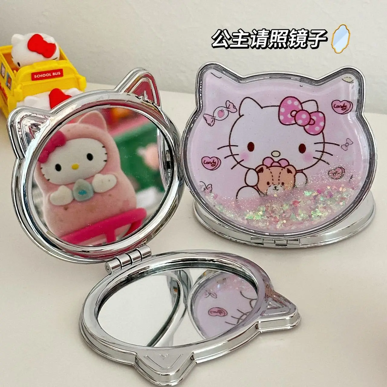 

Sanrio Hello Kitty Quicksand Small Mirror Portable Mini Quicksand Double Sided Mirror with Foldable Handheld Beauty Mirror