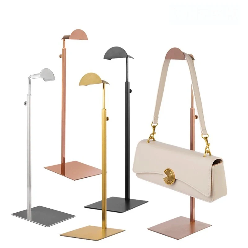

custom.Ready to Ship Shiny Gold Stainless Steel Hanging Bag Rack Standing Metal Hand Bag Display Stand Shop