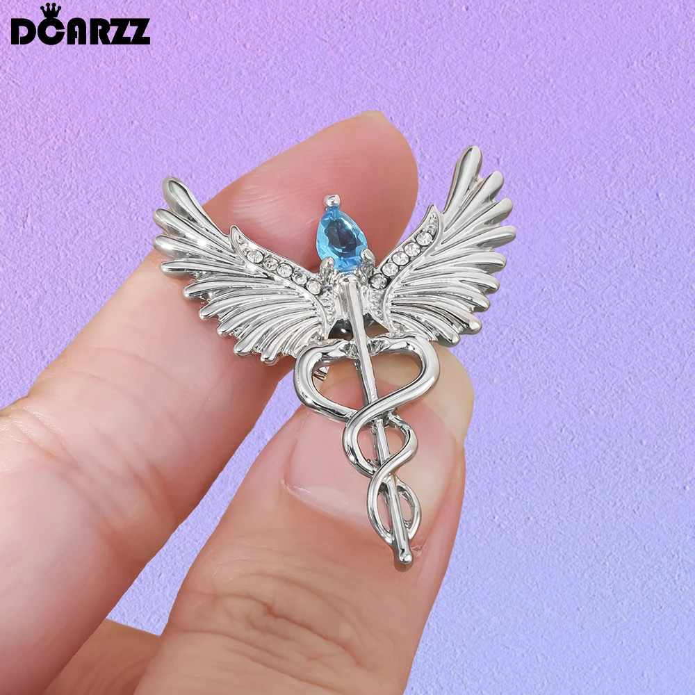 DCARZZ Pin de caduceo de ala angular con broche médico de cristal para médico enfermera solapa mochila insignia joyería de medicina