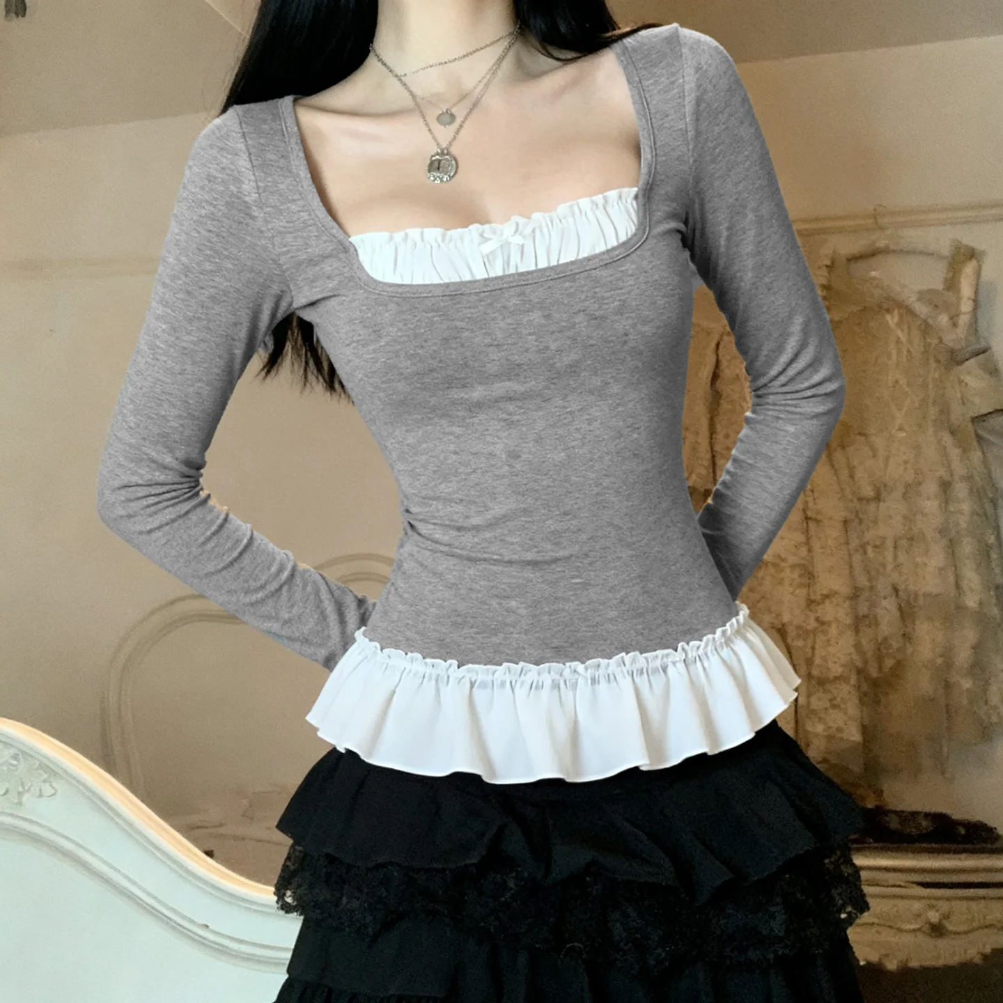 Herfst en winter lotusblad rand zoet slim fit vierkante hals strik patchwork nep tweedelig T-shirt met lange mouwen voor dames