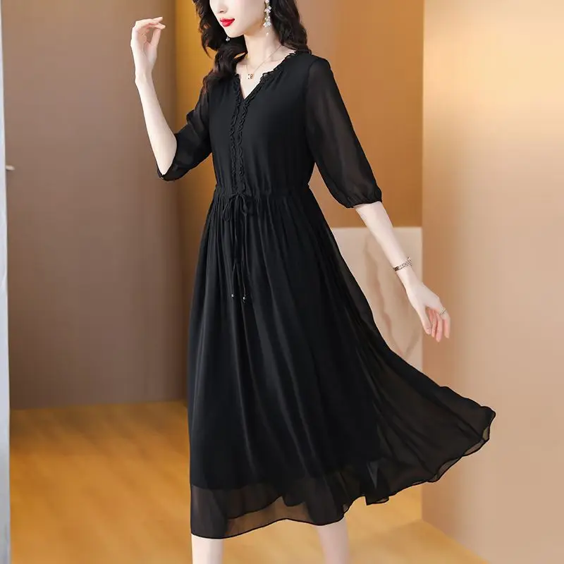 

Women's Black V-Neck Half-Sleeve Chiffon Midi Dress With Ruffled Detail And Drawstring Waist