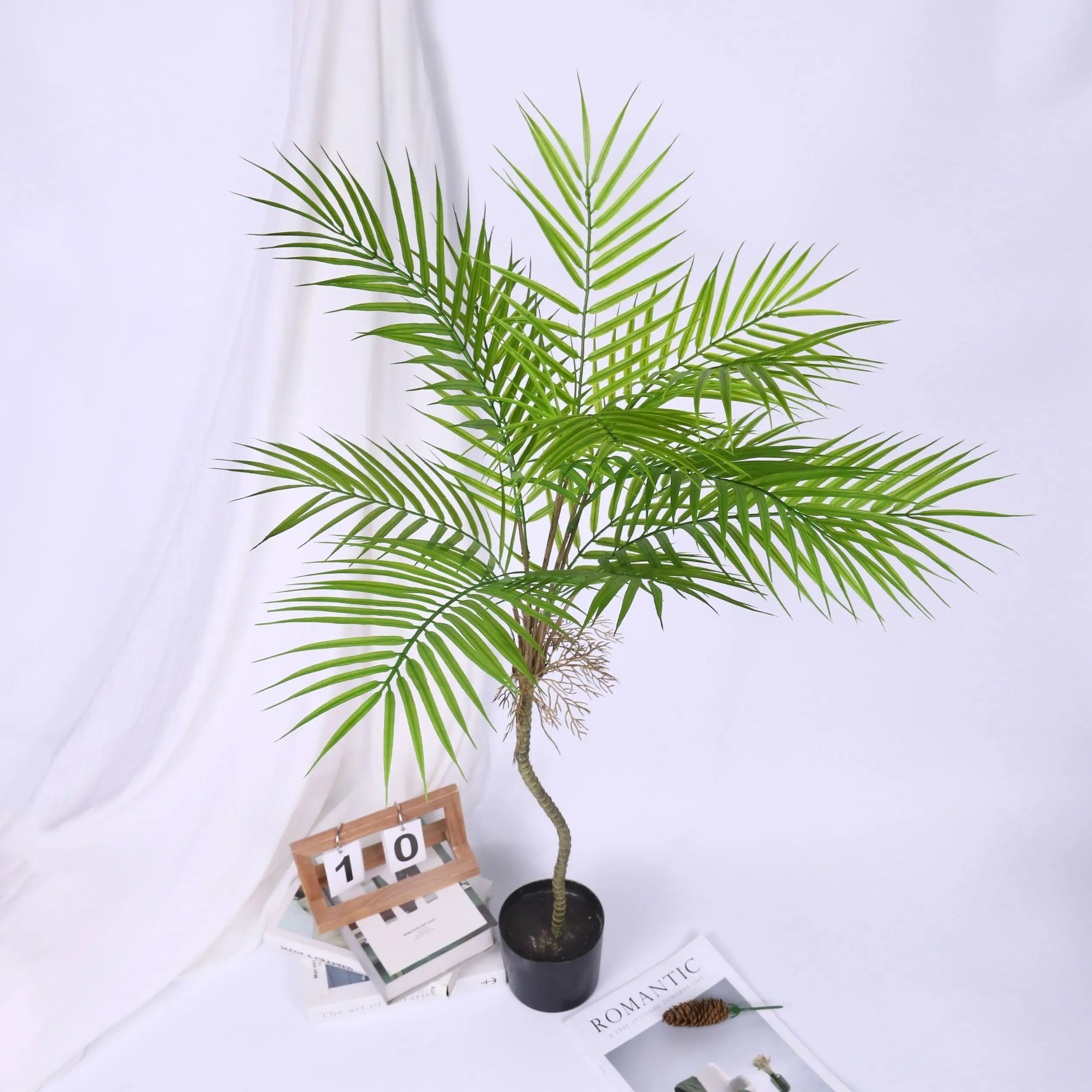 

Two large artificial palm tree, tropical green leaves, fake plants, plastic artificial branches, household kitchen decoration