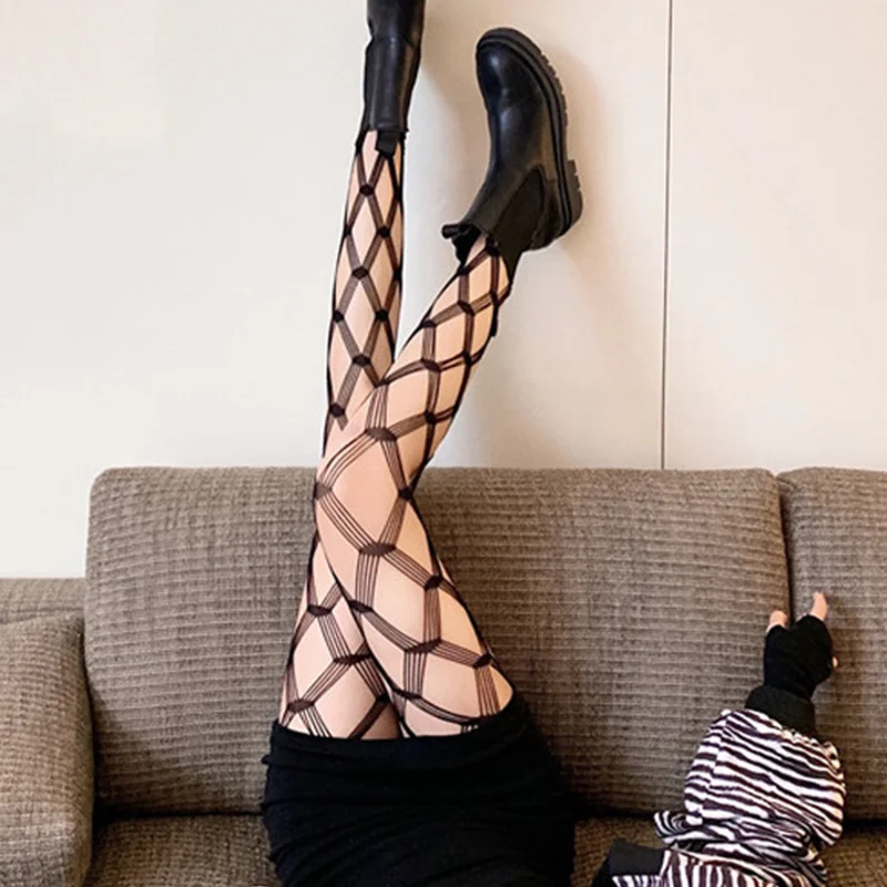 A pair of women's large mesh hollowed-out bottom mesh pants five-line diamond jacquard fishnet tights nightclub pantyhose