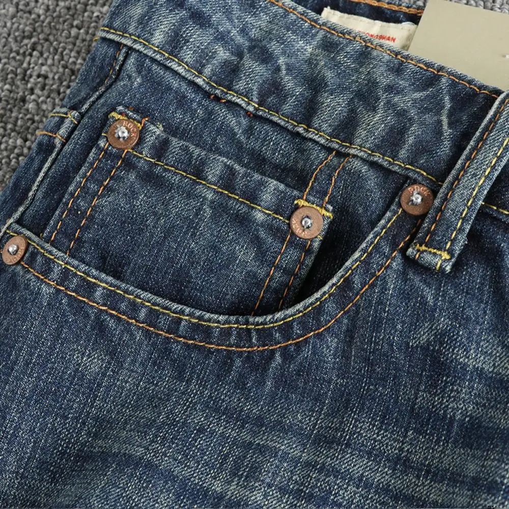 Lavaggio vintage per realizzare vecchi jeans da uomo con tasca senso del design, pantaloni casual a gamba dritta di tendenza americana