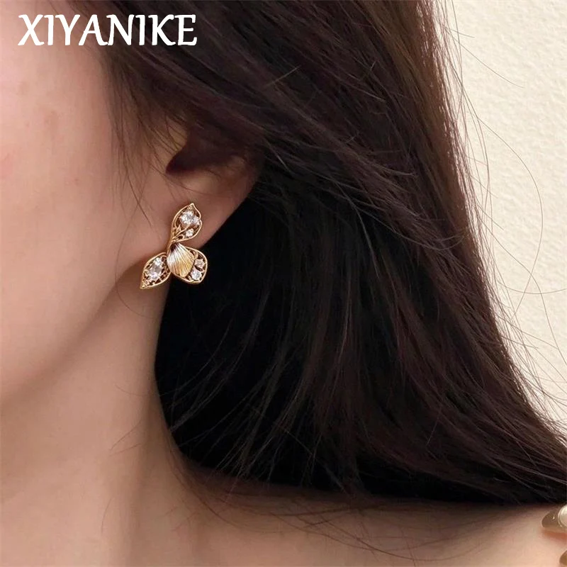 XIYANIKE Vintage Hollow Leaf Zircon Stud Piercing Earrings For Women Girl Fashion New Year Jewelry Gift Party серьги женские