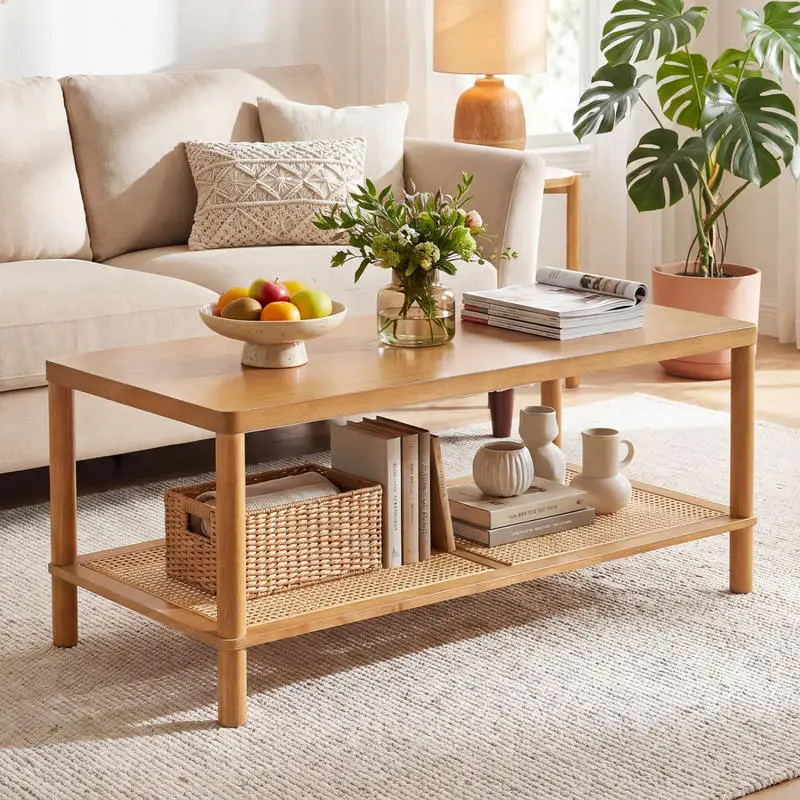 Rustic brown rubberwood coffee table with lower woven rattan shelf
