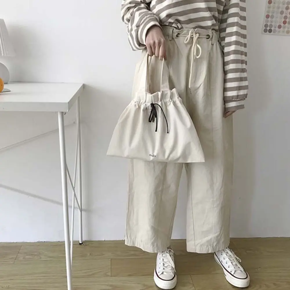 Portable Printed White Drawstring Wrist Bag Letter Korean Style Spring Outing Handbag Large Capacity Women Small Purse Girls