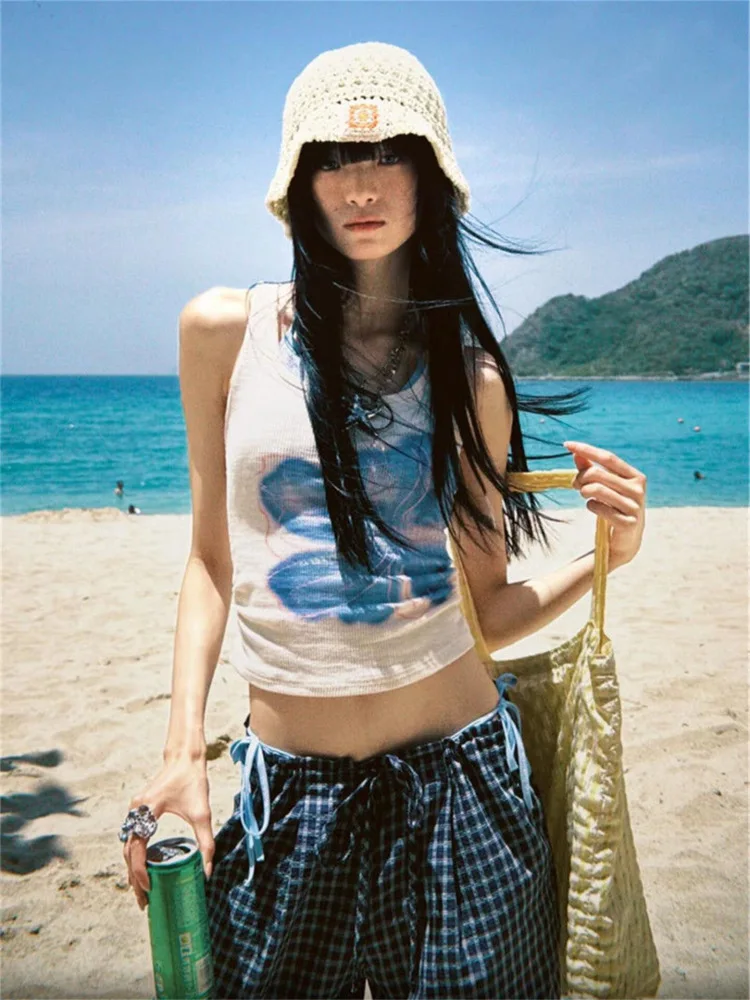 태국 스타일 매운 소녀 순수한 욕망 작은 난초 프린트 스트랩 조끼 여성 슬리밍 여름 탑 내부 및 외부 착용 유행