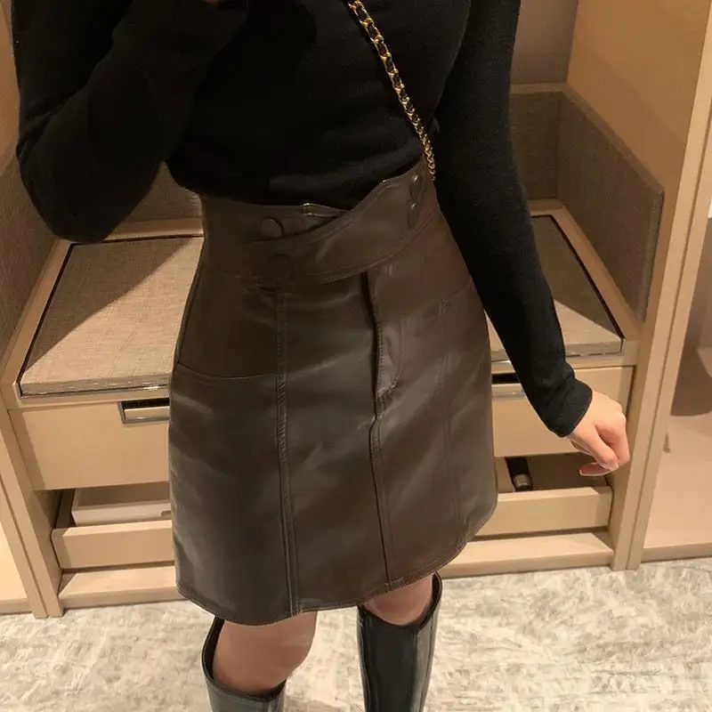 Temperament Autumn WinterWomen Solid Button Zipper Asymmetrical High Waist Fashion Slim Pu Leather Short A-line Hip Wrap Skirt