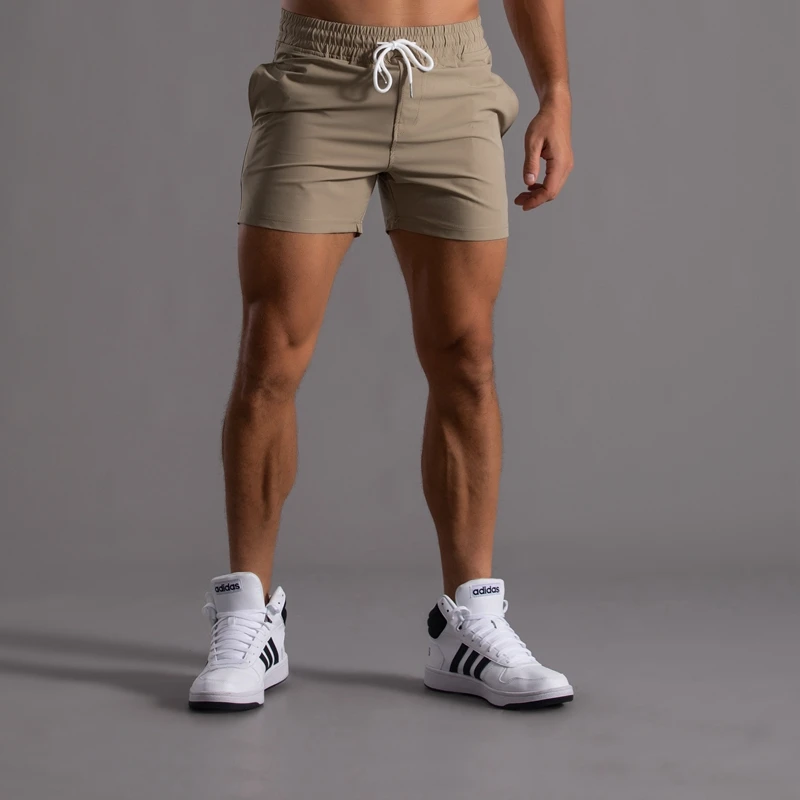 

Мужские цветные спортивные шорты большого размера, длиной до колена, быстросохнущие, эластичные, ультра-комфортные, для бега, средней длины.