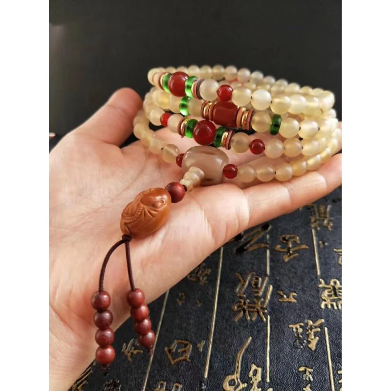 

Natural Cavel 108 Beads, Red Agate, Horn Tee, Olive Heart to Buddha Pendant