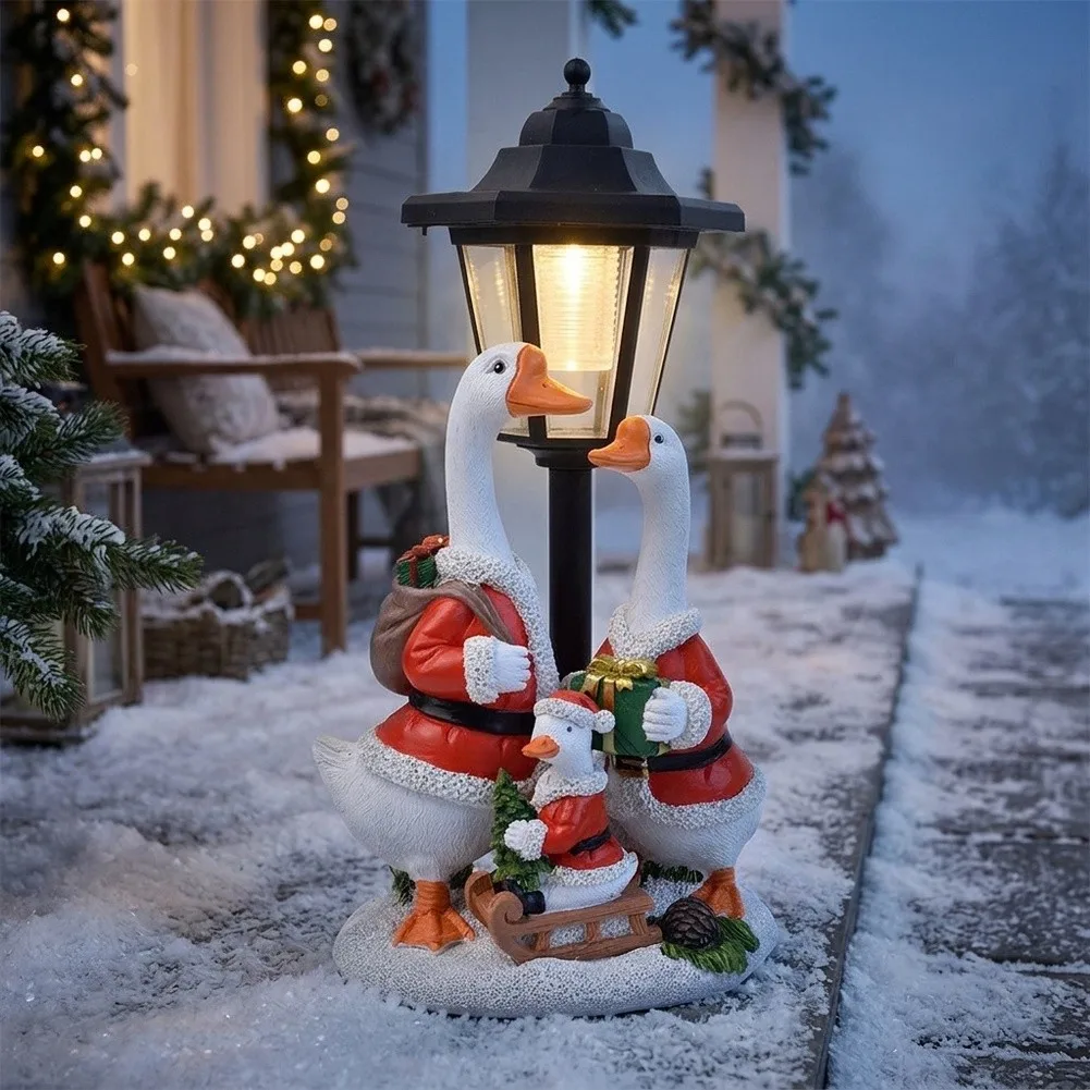 White Resin Solar Powered Goose Figure in Santa Attire for Outdoor Indoor Holiday Decor Garden Patio Porch 16x11.3x31.5cm