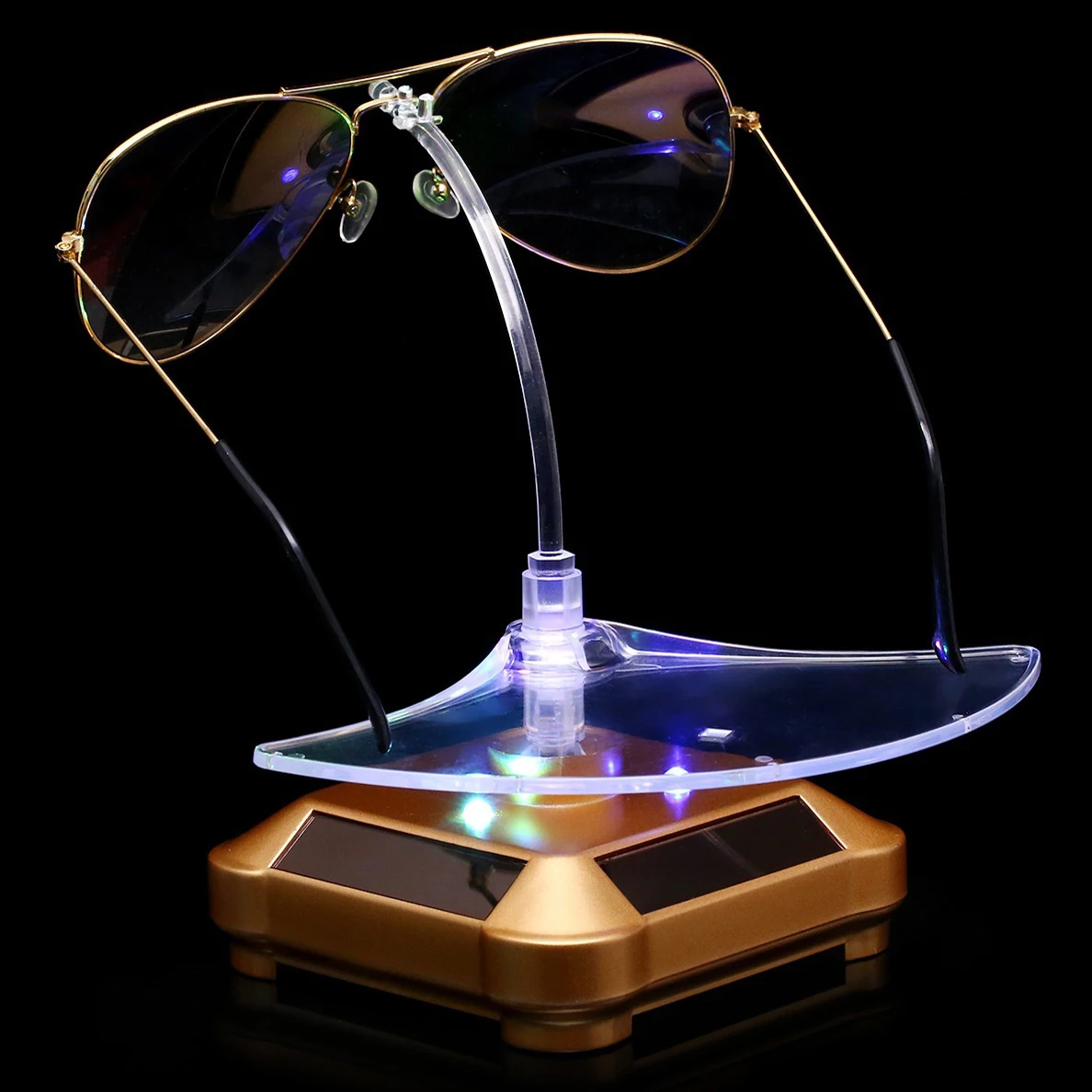 

New Solar Powered Glasses Rotating Display Stand Holder 360 Turntable Curve Presentation Showcase Colorful LED lights