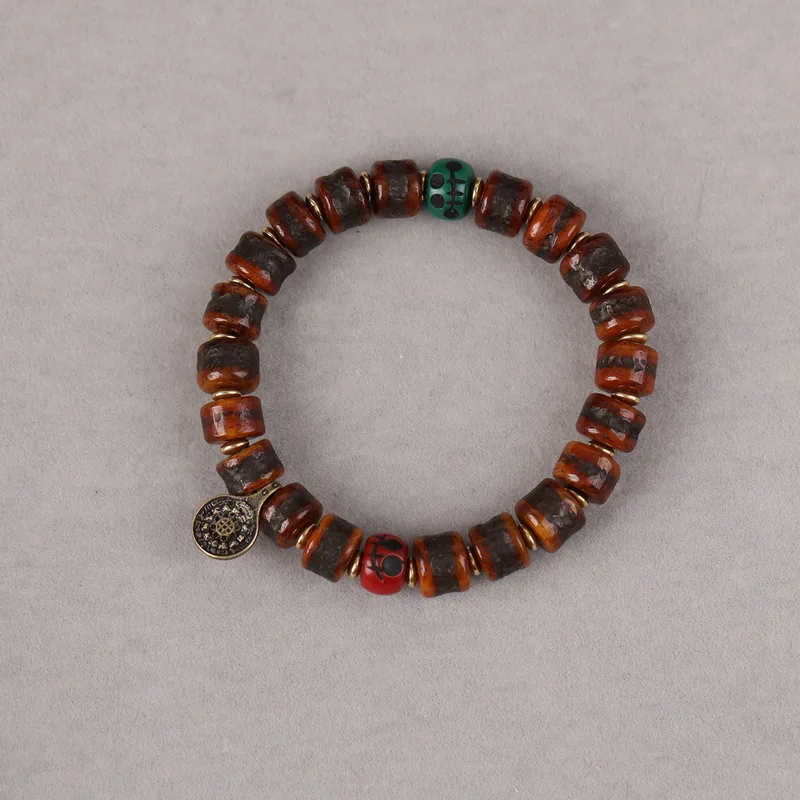 Tibetan-style vintage yak bone barrel bead bracelet with camel bone beads, A-dai Dzi beads, and 999 silver accessories