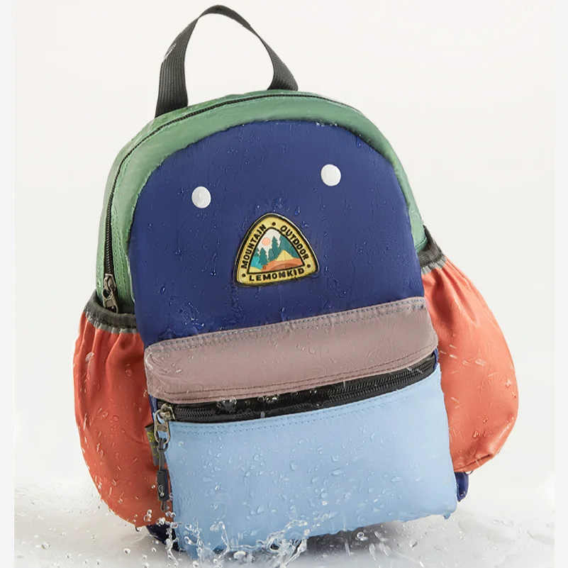 2026 Backpack Dopamine Color Block Japanese Style Pressure Relief Spine Protection Lightweight Casual Daily Travel Outdoor