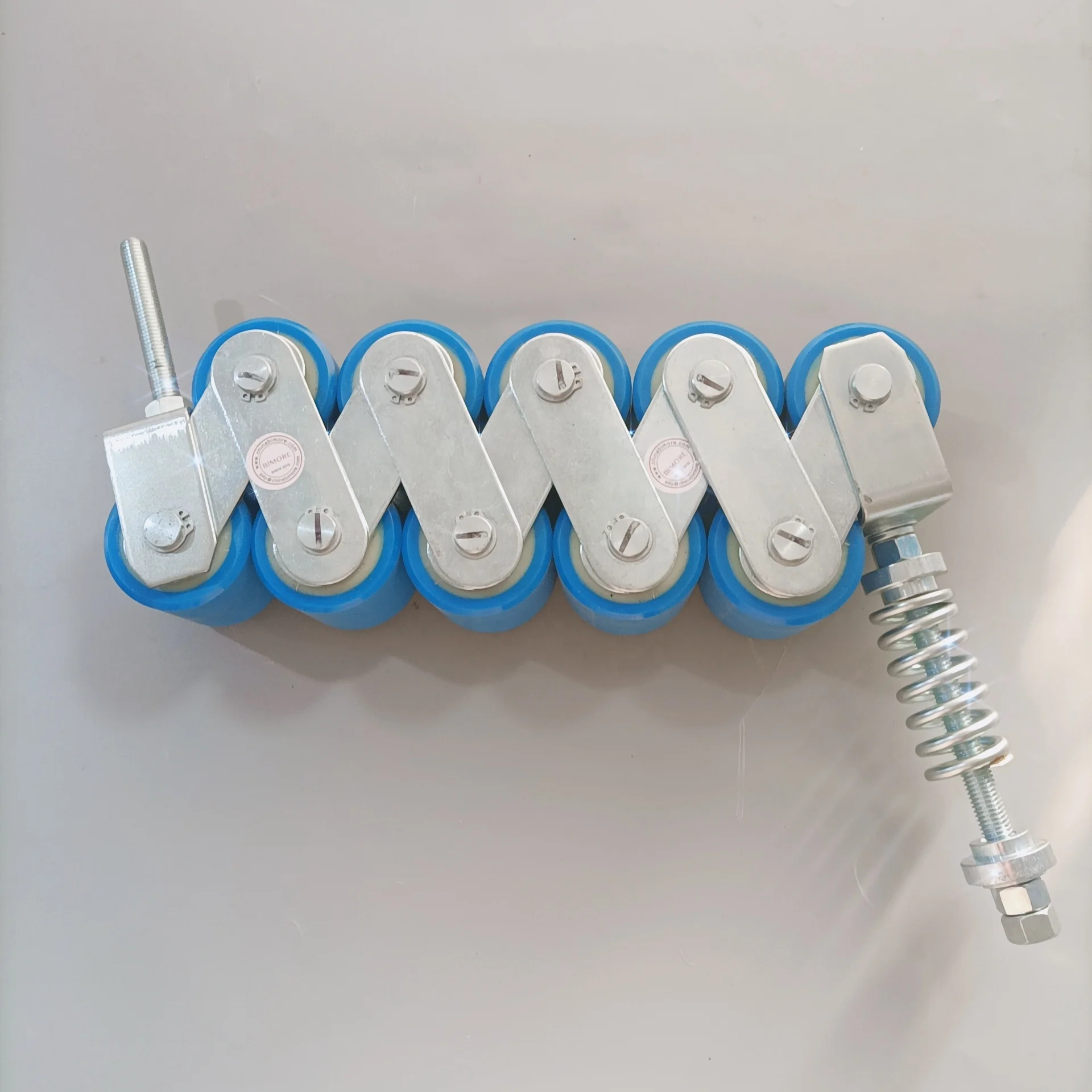 XAA332X Escalator Handrail Pressure Roller 10 Rollers Tension Chain With Spring Plastic Escalator Spare Parts