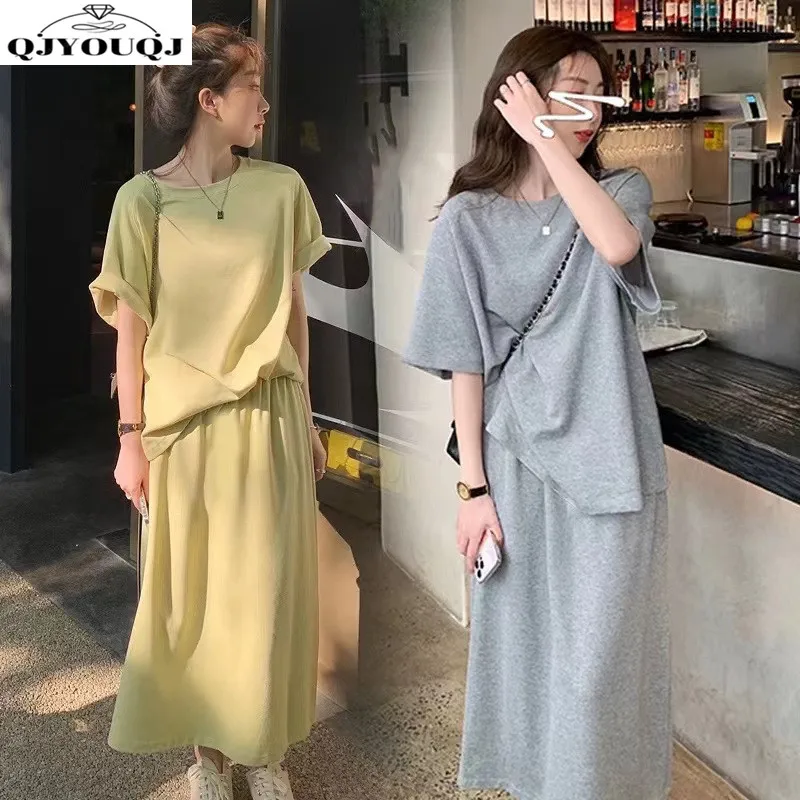 

Spring and summer casual solid color short sleeved T-shirt+mid length slim fit short skirt two-piece set