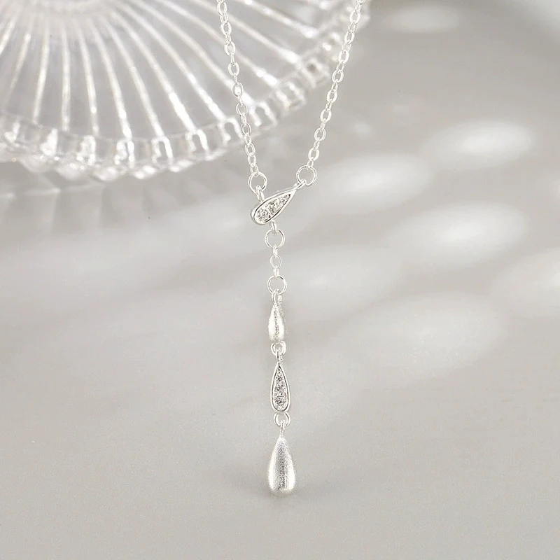 

Новое ожерелье с кисточками и микроинкрустацией цирконом, матовая капля воды для женщин, легкая роскошная цепочка на ключицу из серебра 925 пробы KOFSAC