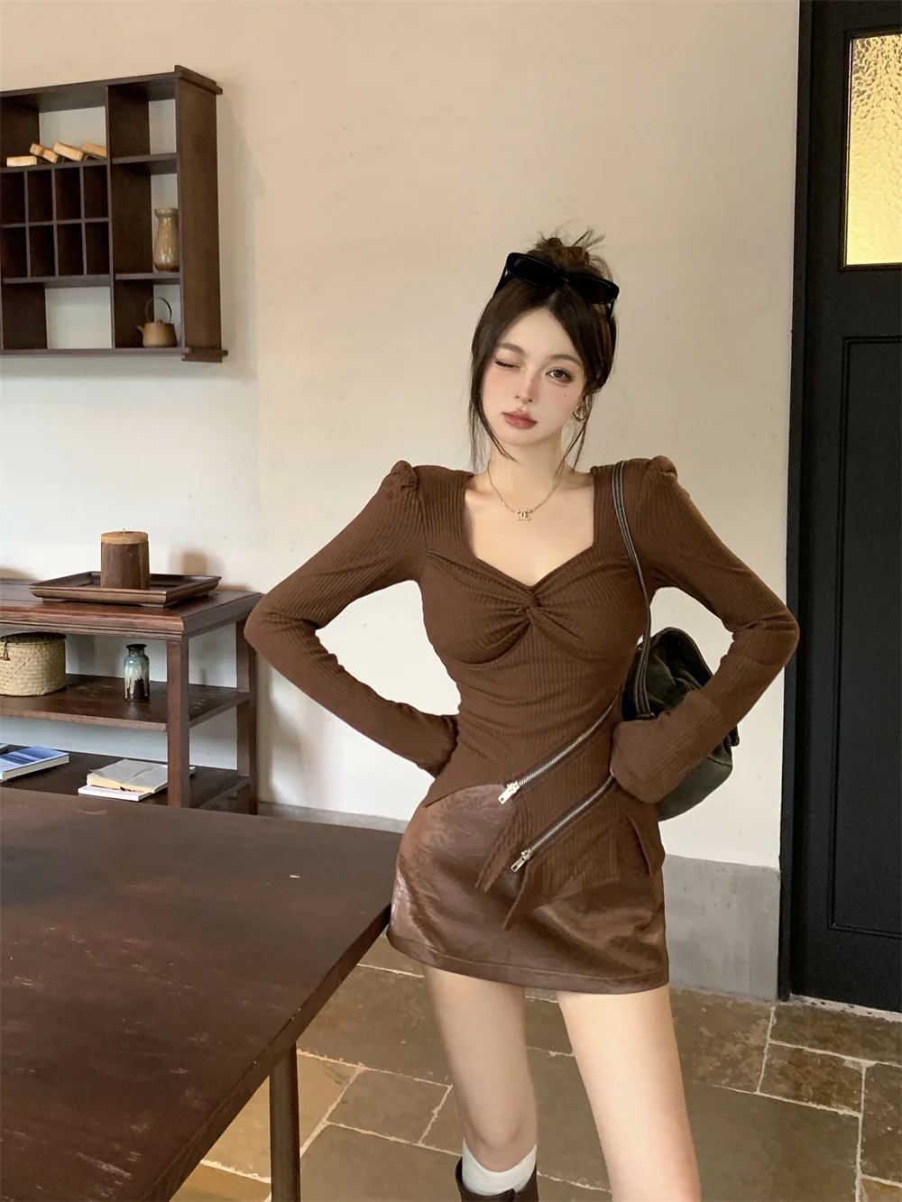 

2024 New Irregular Bottoming Shirt Pinched Waist Design Chic High-end Advanced Temperature Beautiful Top + Leather Skirt Set