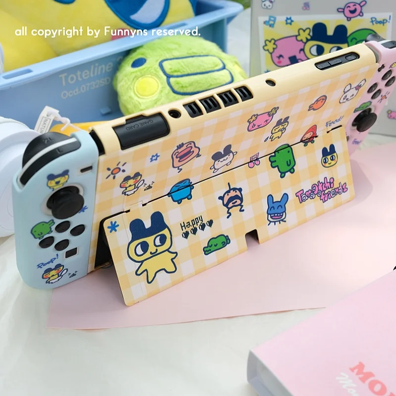 غطاء حماية كرتوني متباين الألوان من Tamagotchi لجهاز Switch OLED Lite Series ملحقات الألعاب NS Shell تصميم لطيف
