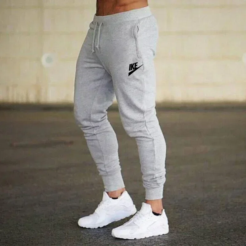 Pantaloni da jogging da uomo pantaloni casual primavera ed estate indossano pantaloni sportivi larghi pantaloni fitness leggeri e traspiranti