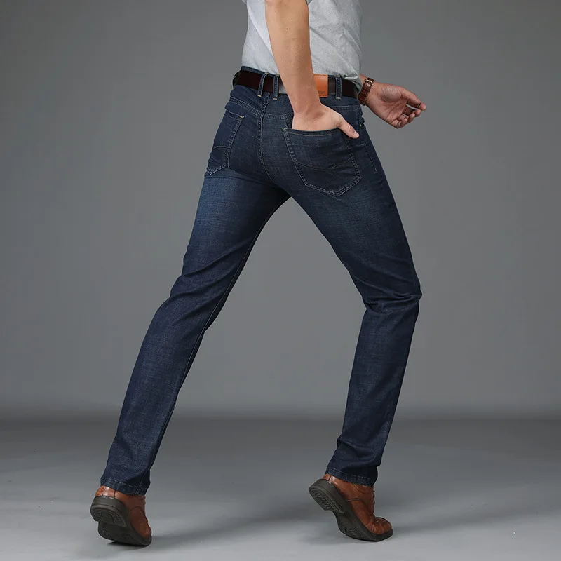Celana Jeans Pria Trendi Musim Semi dan Musim Panas Celana Kasual Bisnis Baru Celana Lurus Longgar Sutra Melar Nyaman
