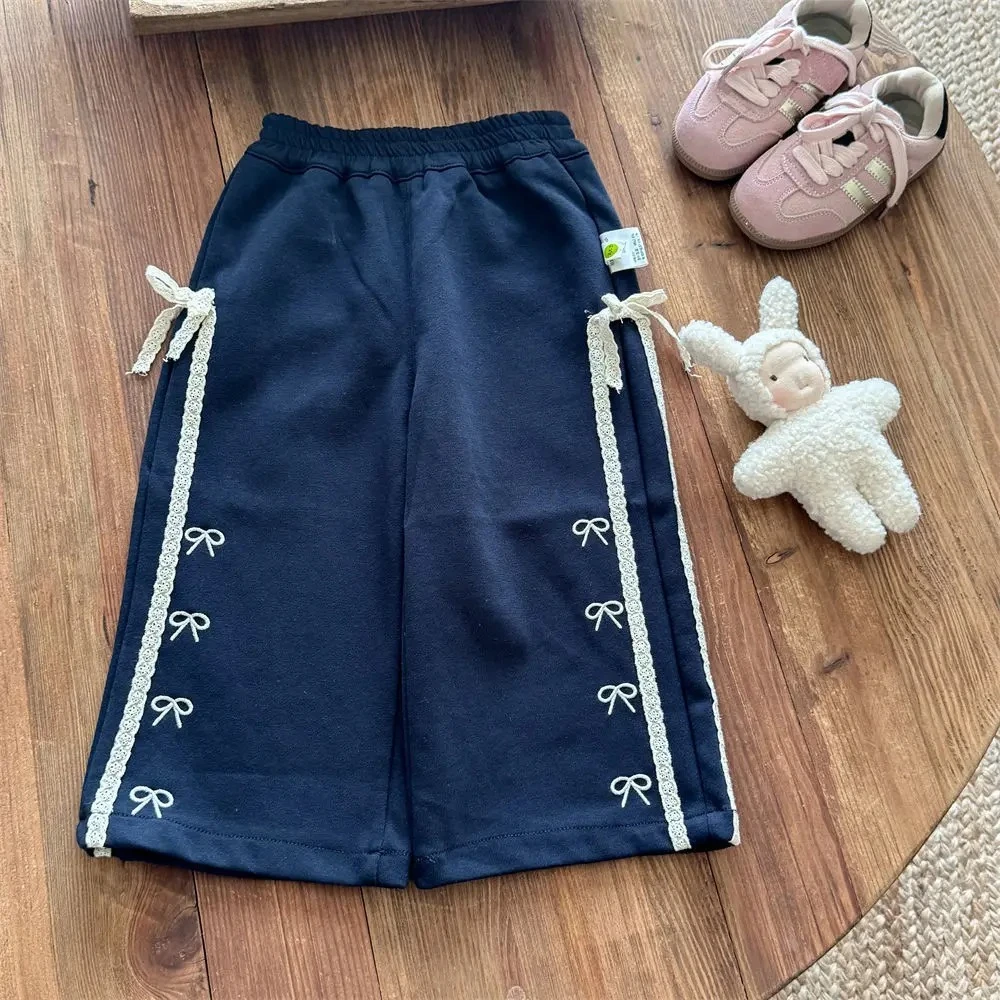 

Осенние темно-синие повседневные брюки для девочек с украшением в виде банта и цветными блоками, корейская версия, прямые широкие брюки