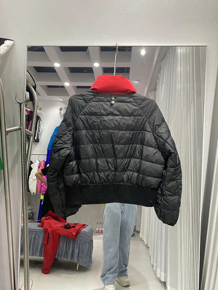 Cappotto di design per bambole di cartone animato in piuma d'anatra bianca corta casual da donna Giacca da donna con cappuccio e ispessita per esterni di fascia alta alla moda