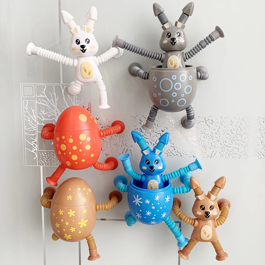 吸盤付きのマルチカラーの小さなウサギのおもちゃとチューブ引きのおもちゃはストレス解消に最適です。 装飾品として使用できます。