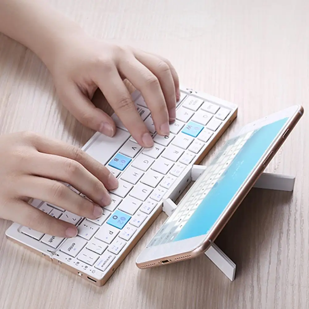 Keyboard Bluetooth nirkabel lipat Mini, dudukan ponsel portabel ringan untuk Tablet dan Android