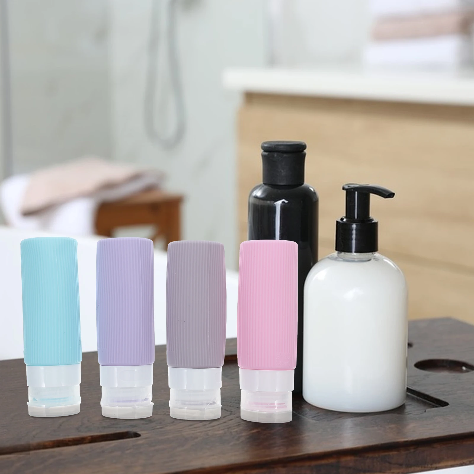 

4 Pcs Airplane Travel Bottles Travel Silicone Lotion Bottle Set Empty Toiletries Bottles for Shampoo Bath Accessories