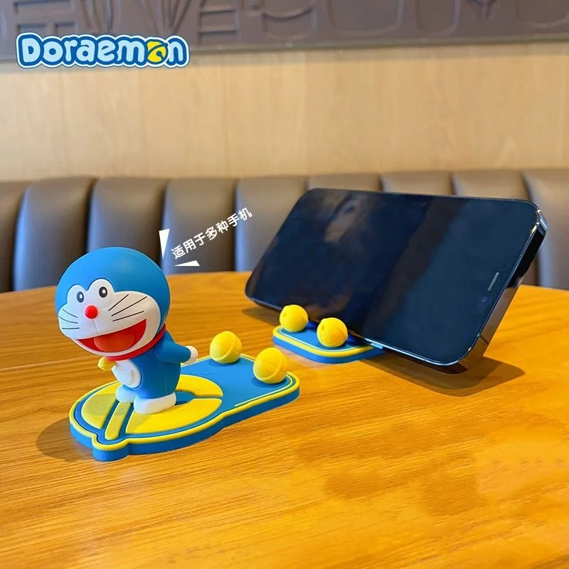 Doraemon Anime Desk Phone Holder Can Be Fixed Inside The Car Holder Silica Gel Bracket Table Toys Stand Ipad Iphone Universal ﻿