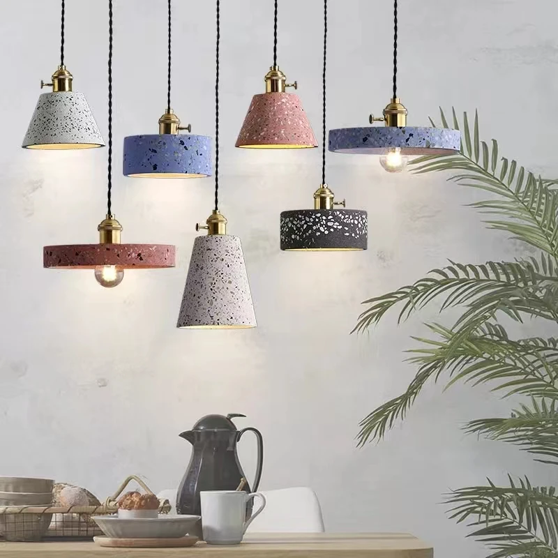 

Modern Industrial Style Cement Pendant Light: The lighting fixtures for the restaurant, bar counter, and kitchen island