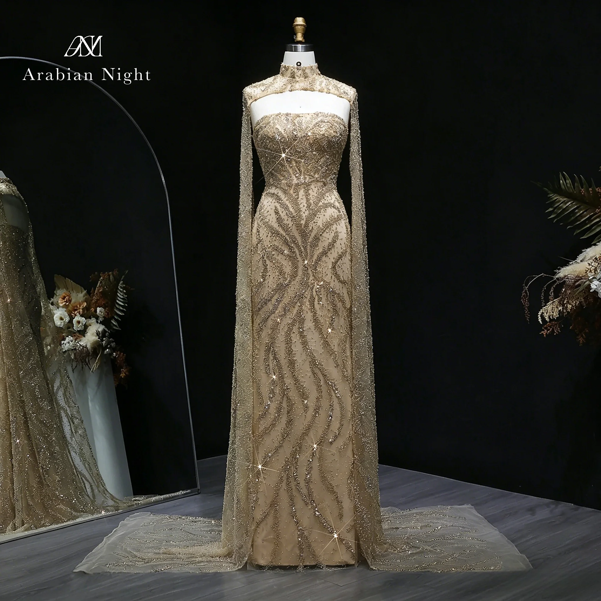 Gold strapless sleeveless mermaid floor-length formal ball gown with sequined halter neck and shawl sleeves