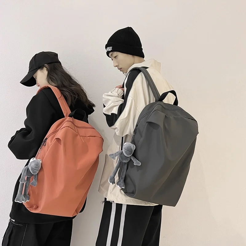 Mochilas escolares para hombres y mujeres, versión coreana de estudiantes de secundaria, mochila japonesa de estilo Hong Kong, hombros simples para mujeres