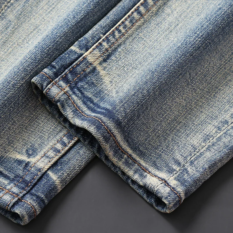 Men Light Blue Jeans Faded Streaky Washed Finish Stretch Slim Pants Classic High‑Street Hip‑Hop Style Denim JeansY2K