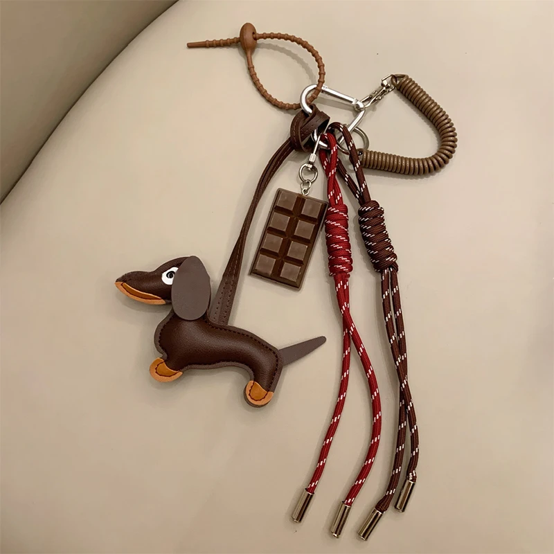 Dijes Dachshund perro bolsa colgante, adorno lindo creativo colgante de cuerda de nailon para accesorios de teléfono llavero de coche decoraciones para mascotas