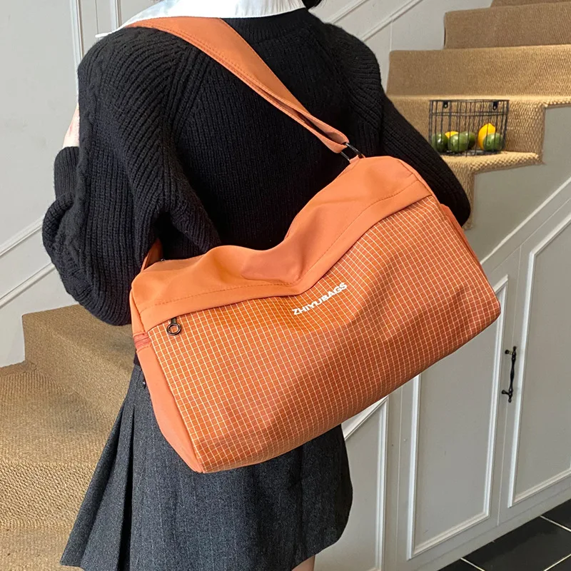 

Travel Bags Women's Shoulder Crossbody Duffle Bag 2026 Short-distance Large-capacity Luggage Simple Sports Fitness Boarding Bag