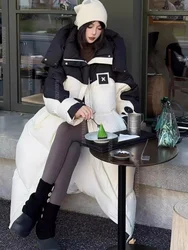 Piumino lungo invernale da donna 90% piumino d'anatra bianco piumino lungo spesso femminile sciolto caldo con cappuccio colore splicing abbigliamento femminile