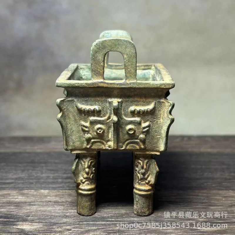 square with animal face pattern, aged bronze tripod ornament, vintage Shang and Zhou period decorative incense bur
