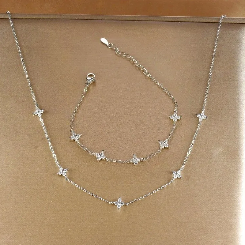 

Стерлингового серебра 925 пробы, четырехлистный цветок, ожерелье, браслет, набор для женщин, винтажный дизайн, сверкающий комплект ювелирных изделий, вечерние ювелирные изделия, подарки